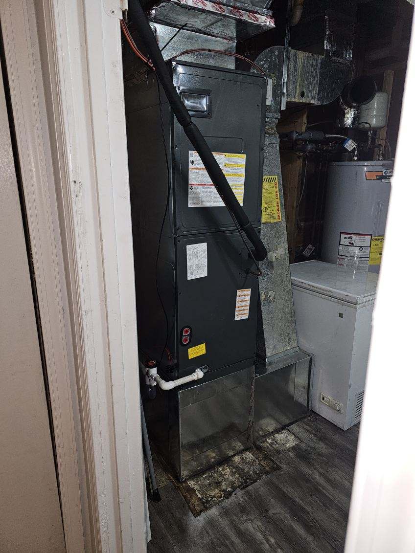 Indoor air handler installed by Amen HVAC in a Maryland home
